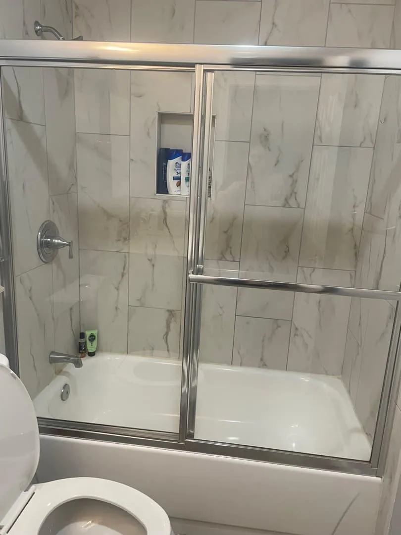 Sparkling marble bathroom by WHB Cleaning